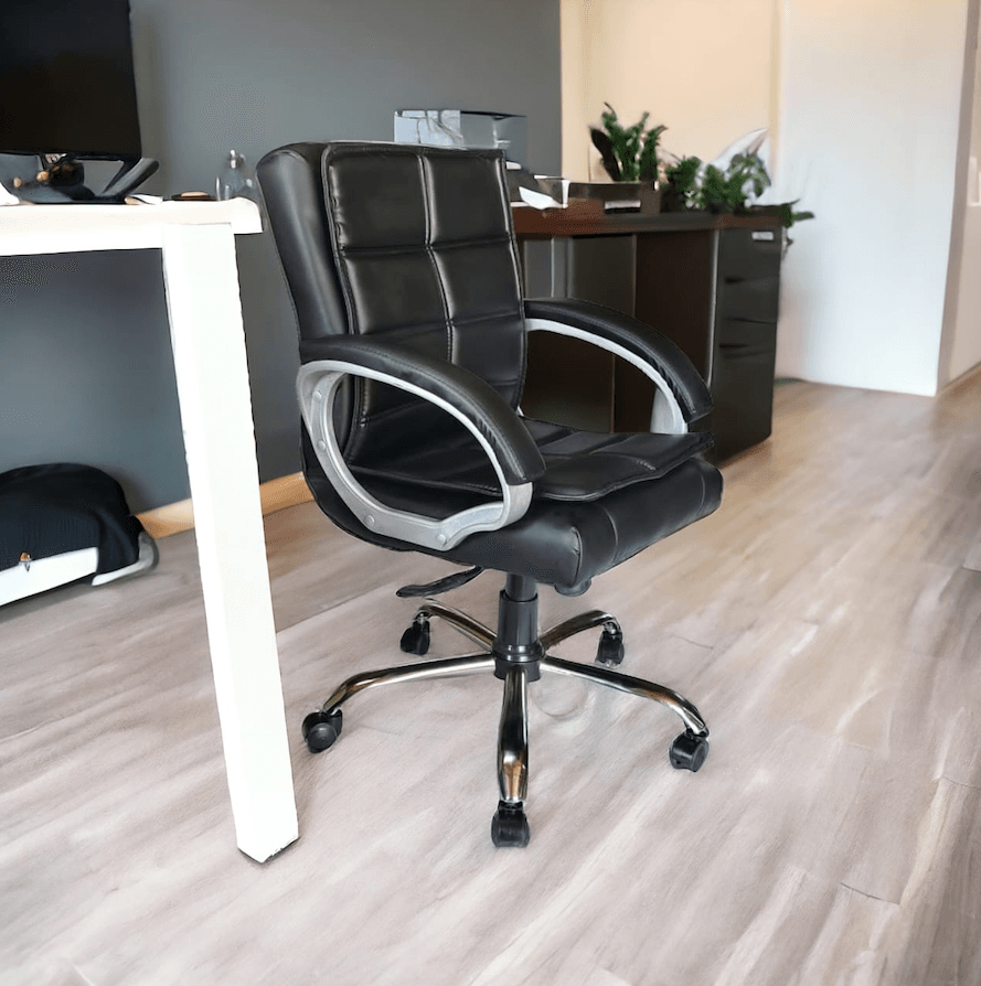 a black office chair in a room